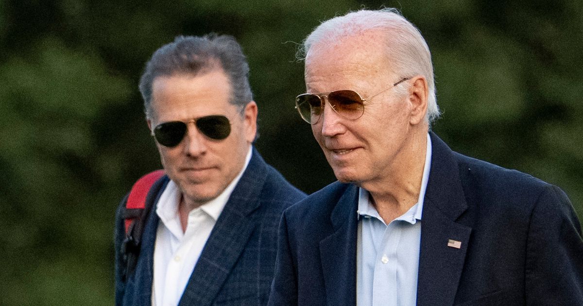 President Joe Biden, right, and his son Hunter Biden arrive at Fort McNair in Washington on June 25.