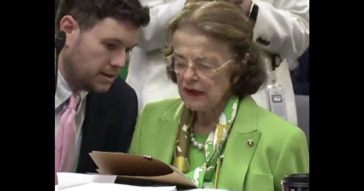 Democratic Sen. Dianne Feinstein required help voting on a bill during a committee hearing on Thursday.