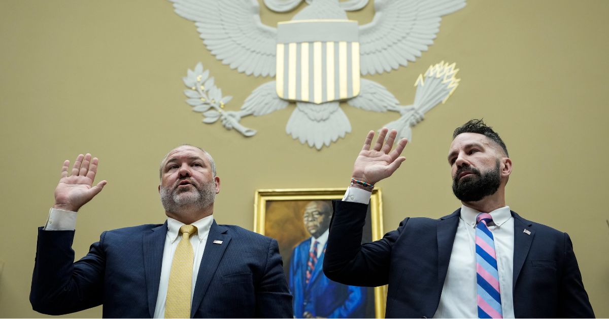Gary Shapley, left, and Joseph Ziegler are sworn in during a House Oversight Committee hearing related to the Justice Department's investigation of Hunter Biden on July 19 in Washington, D.C.