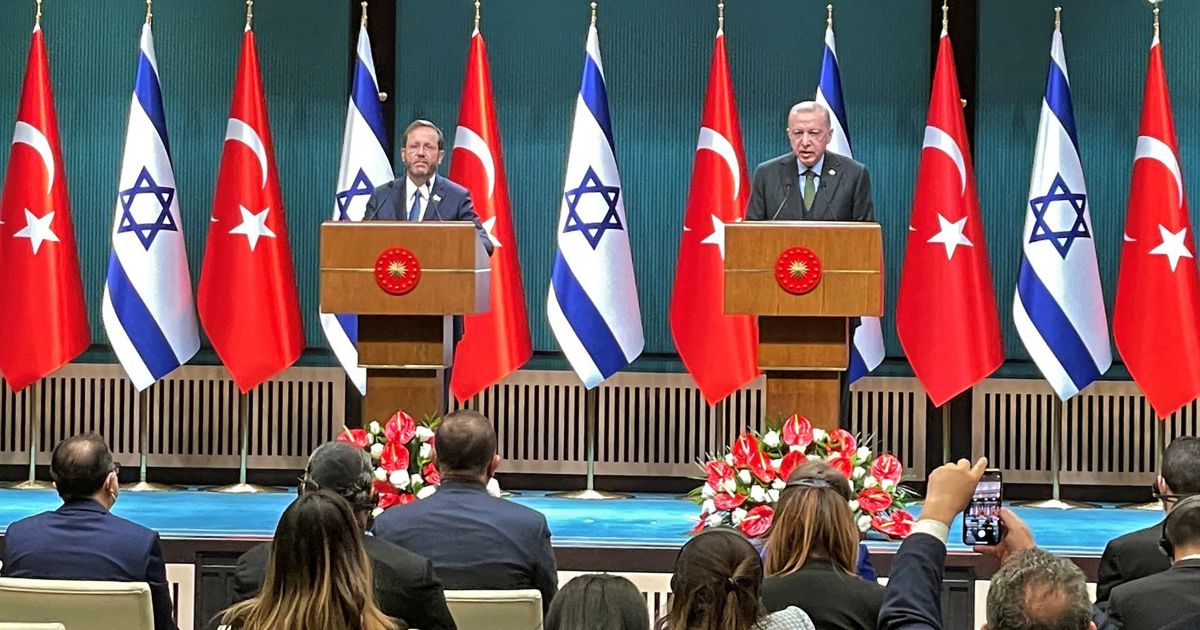 Israeli President Isaac Herzog, left, and his Turkish counterpart, Recep Tayyip Erdogan, give a joint news conference in the capital Ankara on March 9, 2022.