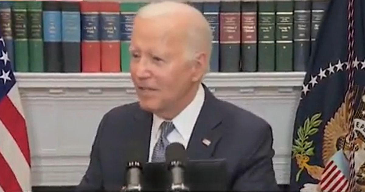 President Joe Biden responds to a question at the White House regarding a State Department report on the Afghanistan withdrawal on Sunday.