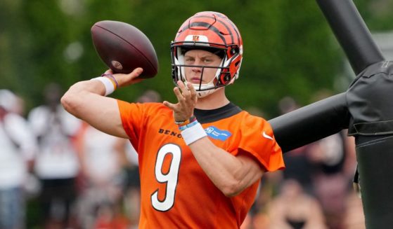 Joe Burrow of the Cincinnati Bengals participates in a drill during training camp at Kettering Health Practice Fields in Cincinnati, Ohio, on Wednesday.