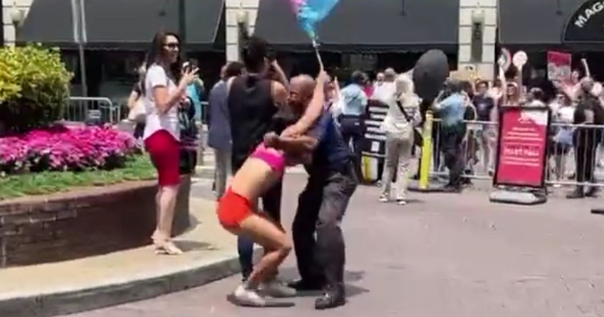A man, who was aggressively waving a transgender flag during a Moms for Liberty event, was taken down by a police officer in Philadelphia.
