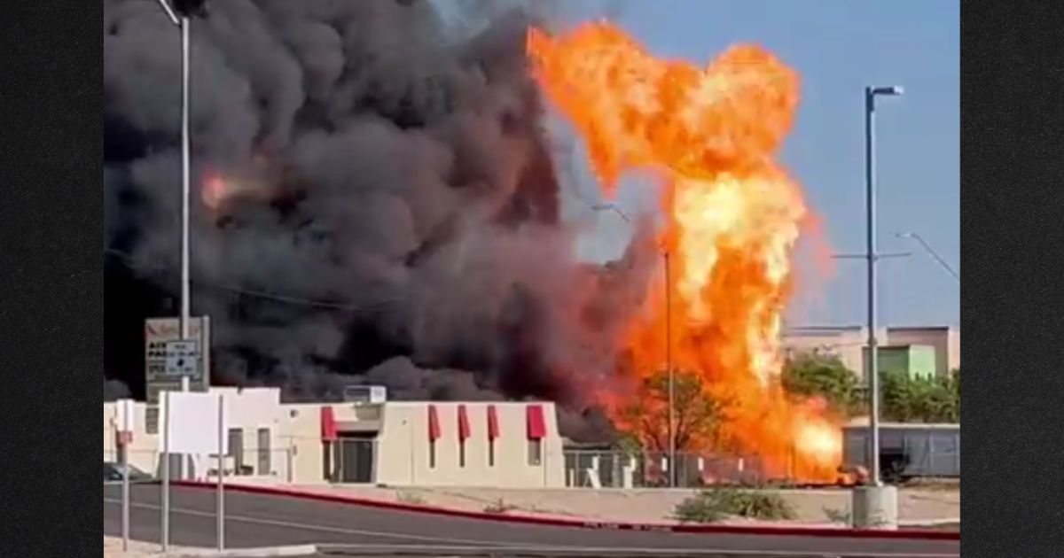 Flames shot into the sky during a fire at a Phoenix propane facility.
