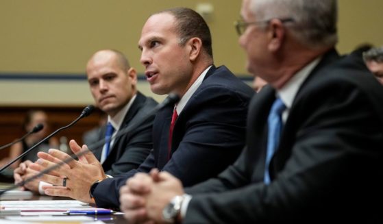 Ryan Graves, David Grusch and David Fravor testify during a House Oversight Committee hearing on unidentified anomalous phenomena on Capitol Hill on Wednesday in Washington, D.C.
