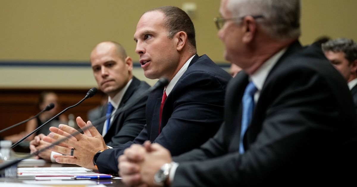 Ryan Graves, David Grusch and David Fravor testify during a House Oversight Committee hearing on unidentified anomalous phenomena on Capitol Hill on Wednesday in Washington, D.C.