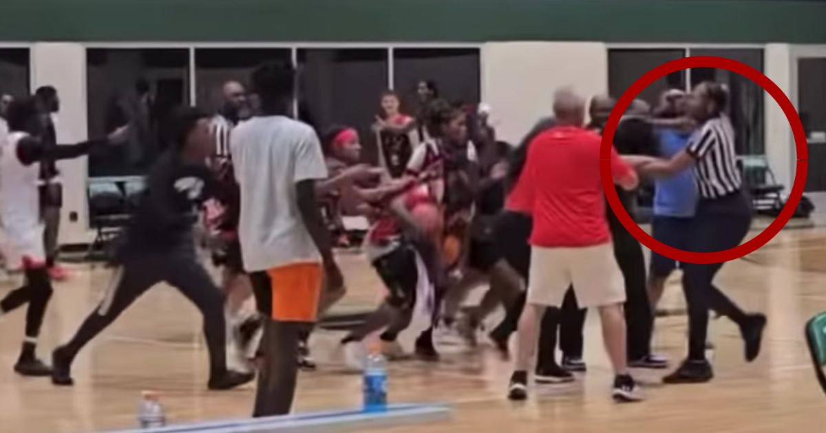 On Sunday, a referee, right, was attacked by the Cincinnati Indians Elite coaches and players towards the end of the game against Kentucky's Dynasty Sports Performance Heat at the Next Level Classic in Fishers, Indiana.