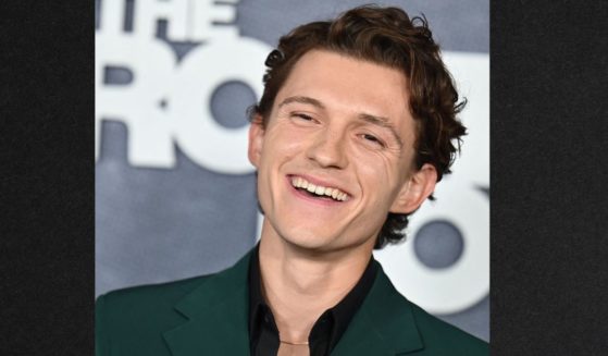 English actor Tom Holland, seen in a June 1 photo, said he tries to keep his distance from Hollywood.