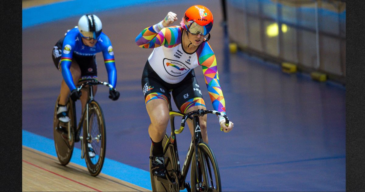 Transgender Canadian cyclist Rachel McKinnon, right, known as "Rhys" when he identified as a male, celebrates victory over USA's Dawn Orwick in the first race of their F35-39 Sprint Final during the 2019 UCI Track Cycling World Masters Championship, in Manchester, England, on October 19, 2019. The global body governing cycling has ruled that people who go through male puberty must now compete with men.