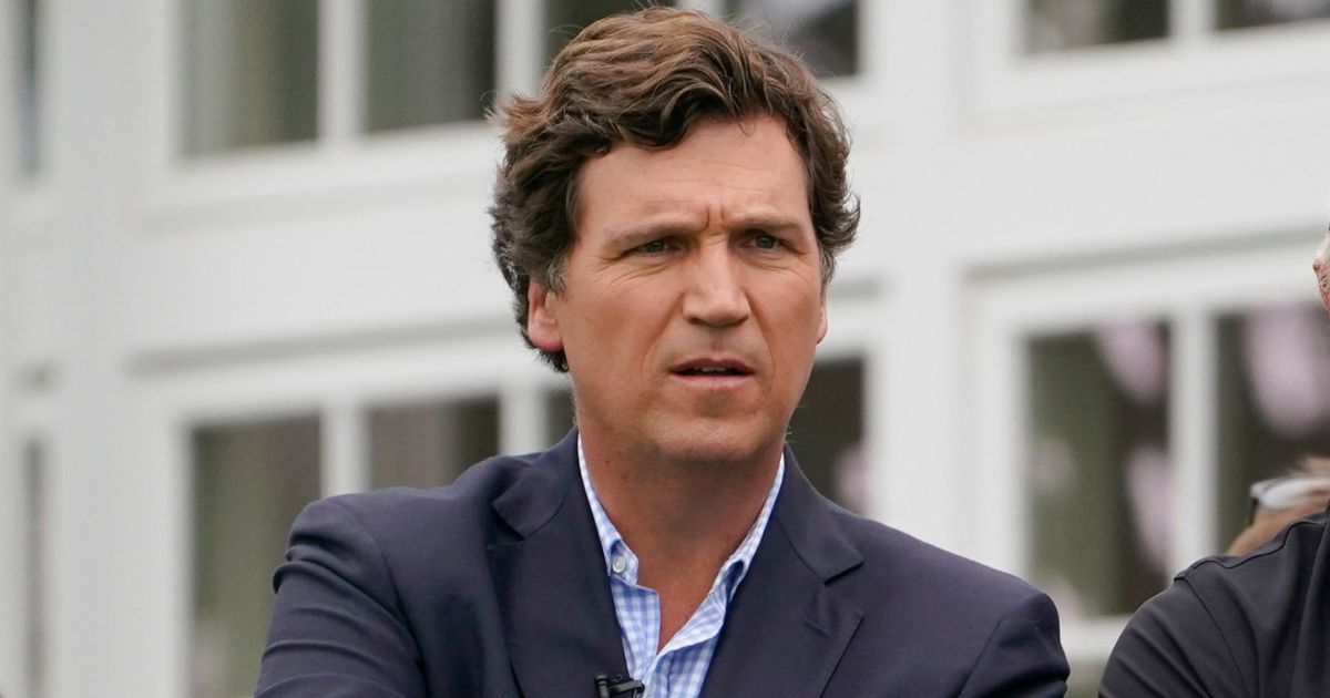 Tucker Carlson attends the final round of the Bedminster Invitational LIV Golf tournament in Bedminster, N.J., Sunday, July 31, 2022.