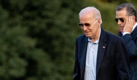 President Joe Biden and his son Hunter arrive at Fort McNair in Washington, D.C., on Sunday. The Bidens were returning from Camp David.