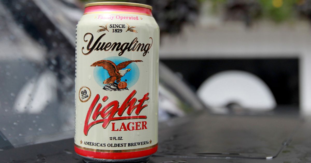 A can of Yuengling Light Lager is seen on the hood of a vehicle in Long Pond, Pennsylvania, on Aug. 2, 2014.
