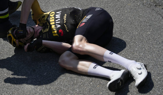 Belgium's Nathan van Hooydonck lies on the ground after a crash during the 15th stage of the Tour de France cycling race on Sunday.