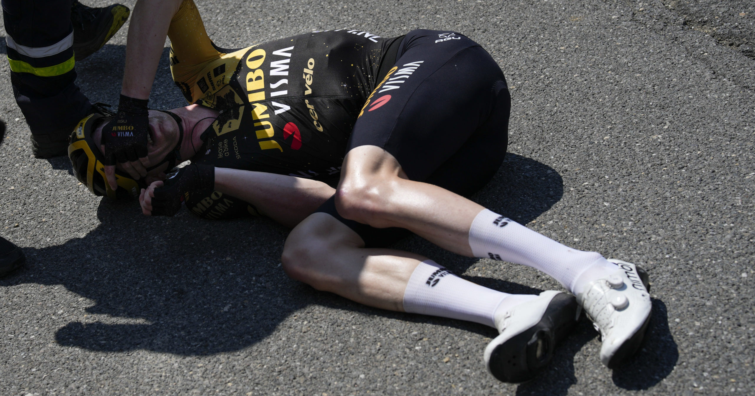 Belgium's Nathan van Hooydonck lies on the ground after a crash during the 15th stage of the Tour de France cycling race on Sunday.