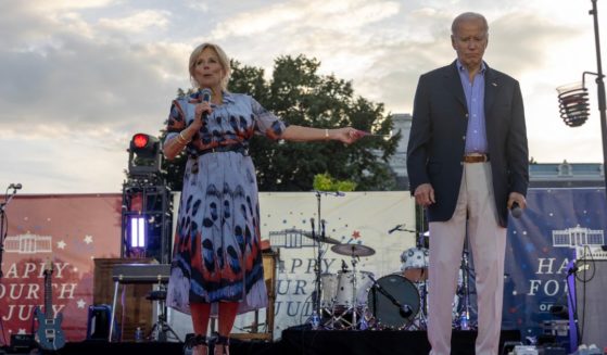 First lady Jill Biden and President Joe Biden speak on stage on the South Lawn on July 4 in Washington, D.C.