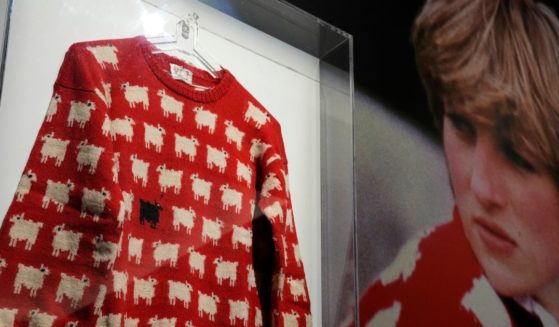 The historic Princess Diana black sheep jumper is on display at the auction house Sotheby's in London, Monday.