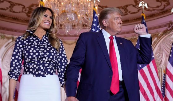 Former President Donald Trump and former first lady Melania Trump are pictured in a file photo from Nov. 15 after Trump announced he was running for president for a third time.