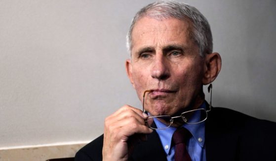 Anthony Fauci listens during a briefing on the coronavirus pandemic in the press briefing room of the White House on March 27, 2020 in Washington, DC.
