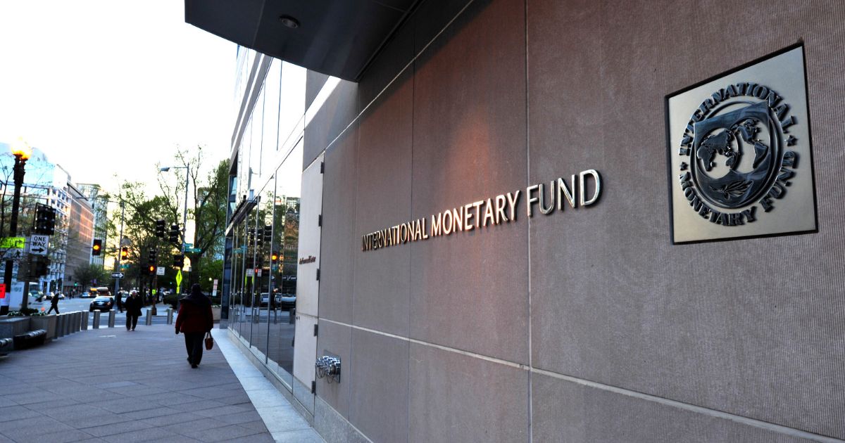 The International Monetary Fund (IMF) building sign is viewed on April 5, 2016, in Washington, D.C.