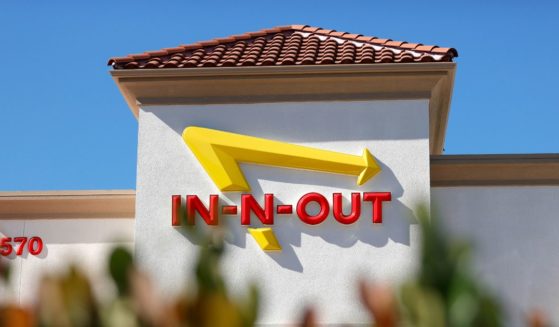 The In-n-Out logo is displayed on the front of an In-n-Out restaurant on October 28, 2021 in Pleasant Hill, California.