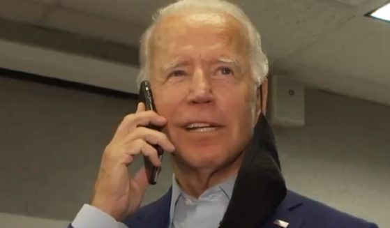 Then-presidential candidate Joe Biden talks on the phone in a video from an October 2020 Twitter post.