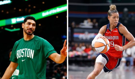 Enes Kanter Freedom, left, of the Boston Celtics, seen in a file photo from October 2021, had a challenge for a WNBA star who was trashing America.