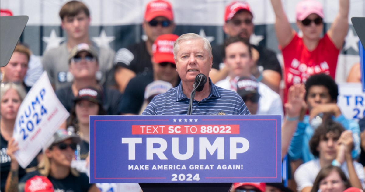 Sen. Lindsey Graham attempts to address the crowd Saturday in Graham's home county of Pickens, South Carolina.
