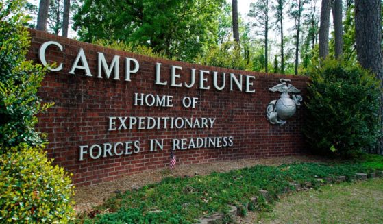 Signage stands on the main gate to Camp Lejeune Marine Base outside Jacksonville, North Carolina, on April 29, 2022.