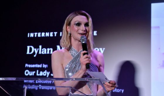 Dylan Mulvaney speaks on stage during the Them Now Awards 2023 at Public Hotel on June 14 in New York City.