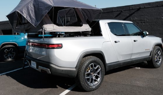 A model of an R1T electric pickup truck by Rivian is pictured in a 2021 file photo.