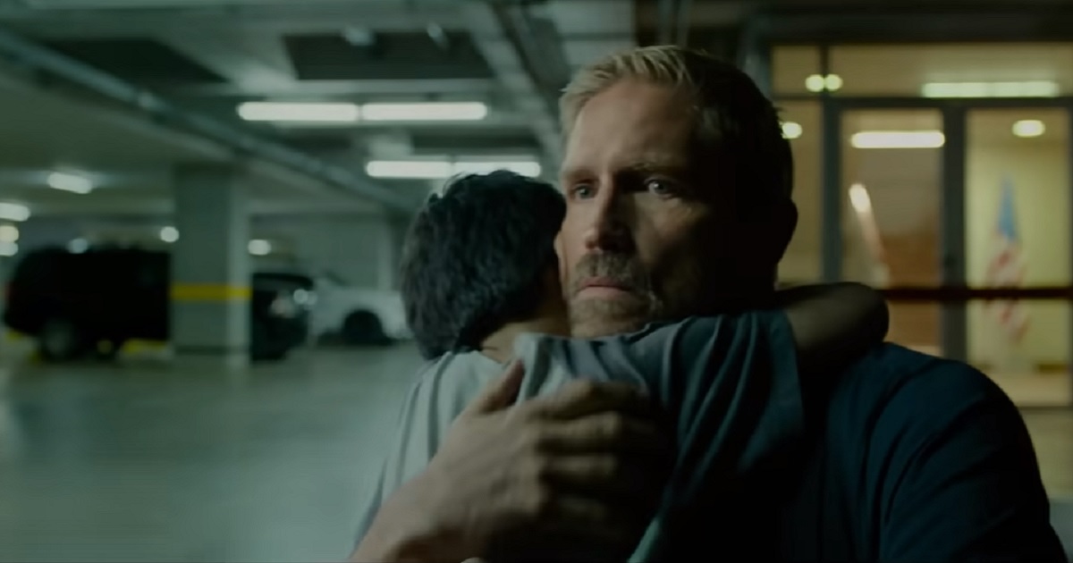 Actor Jim Caviezel hugs a boy he's saved from human traffickers in "Sound of Freedom," movie that's taking on Hollywood's giants.