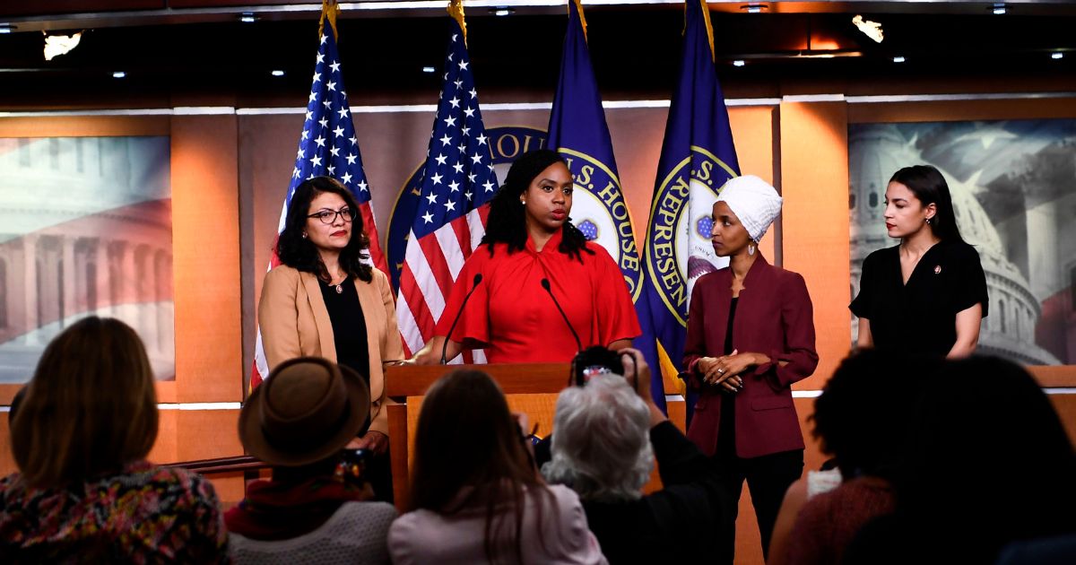 Representatives Ayanna Pressley (D-MA) speaks as, Ilhan Omar (D-MN)(2R), Rashida Tlaib (D-MI) (R), and Alexandria Ocasio-Cortez (D-NY) look on during a press conference, to address remarks made by US President Donald Trump earlier in the day, at the US Capitol in Washington, DC on July 15, 2019.