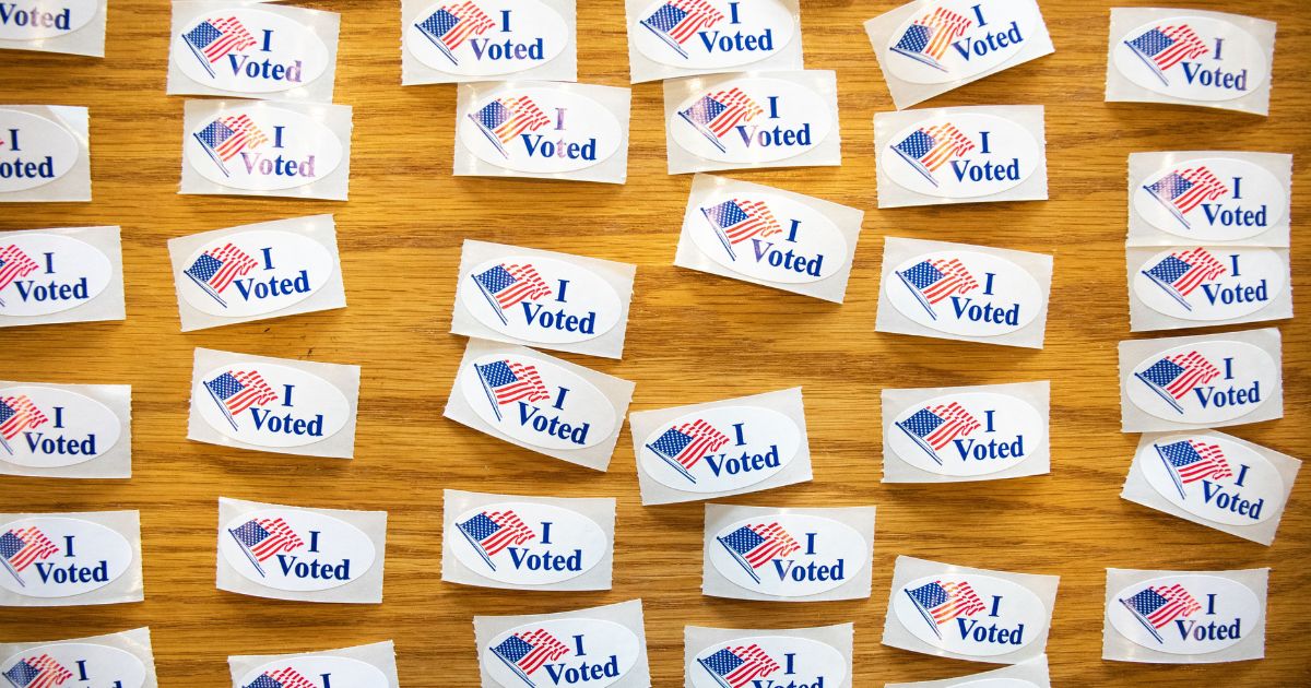 "I Voted" stickers cover a table at a polling station in Charlotte, North Carolina, on March 3, 2020.