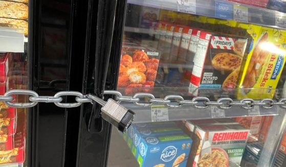 A chain with padlocks secures freezer doors at a Walgreens store on Tuesday in San Francisco, California.