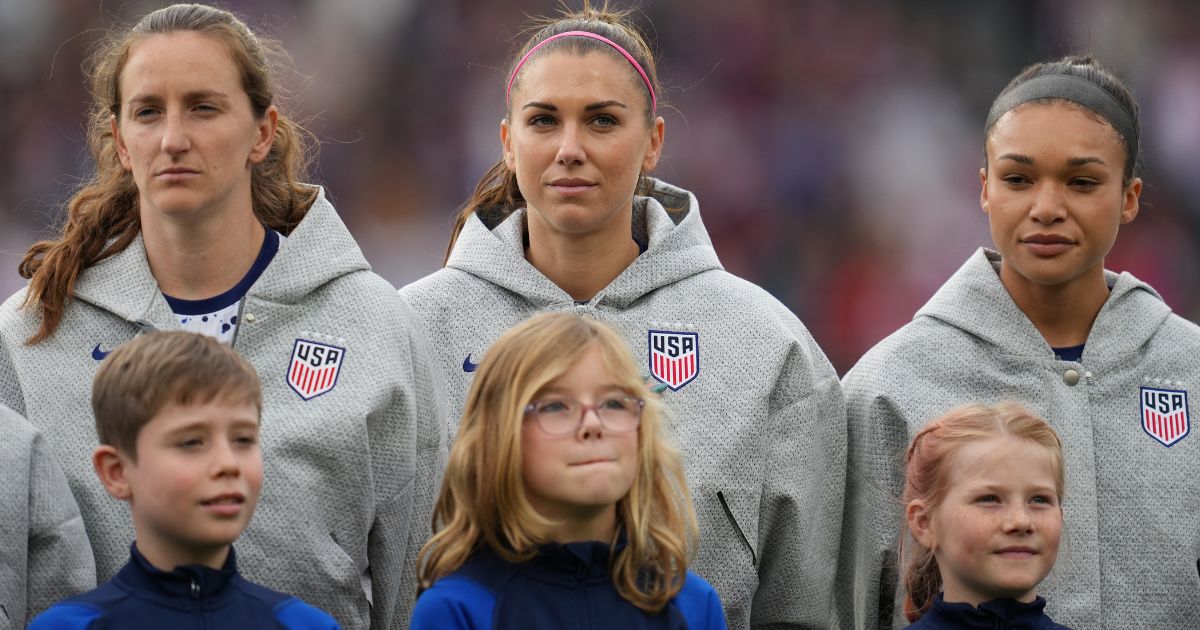 Andi Sullivan #17, Alex Morgan #13, and Sophia Smith #11 of the United States line up prior to their 2023 FIFA Women's World Cup match between USA and Vietnam Saturday in Auckland, New Zealand.