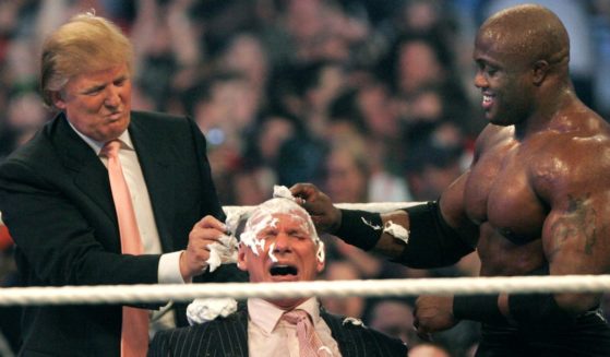 WWE chairman Vince McMahon, center, has his head shaved by Donald Trump, left, and Bobby Lashley, right, after losing a bet in the Battle of the Billionaires at the 2007 World Wrestling Entertainment's Wrestlemania at Ford Field on April 1, 2007 in Detroit, Michigan.