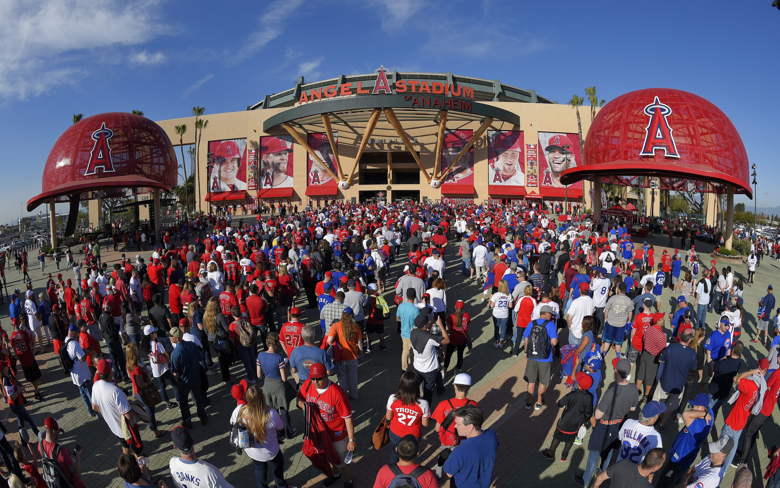 Fans line up outside Angel Stadium in Anaheim, California, for an opening day baseball game between the Los Angeles Angels and the Chicago Cubs on April 4, 2016.