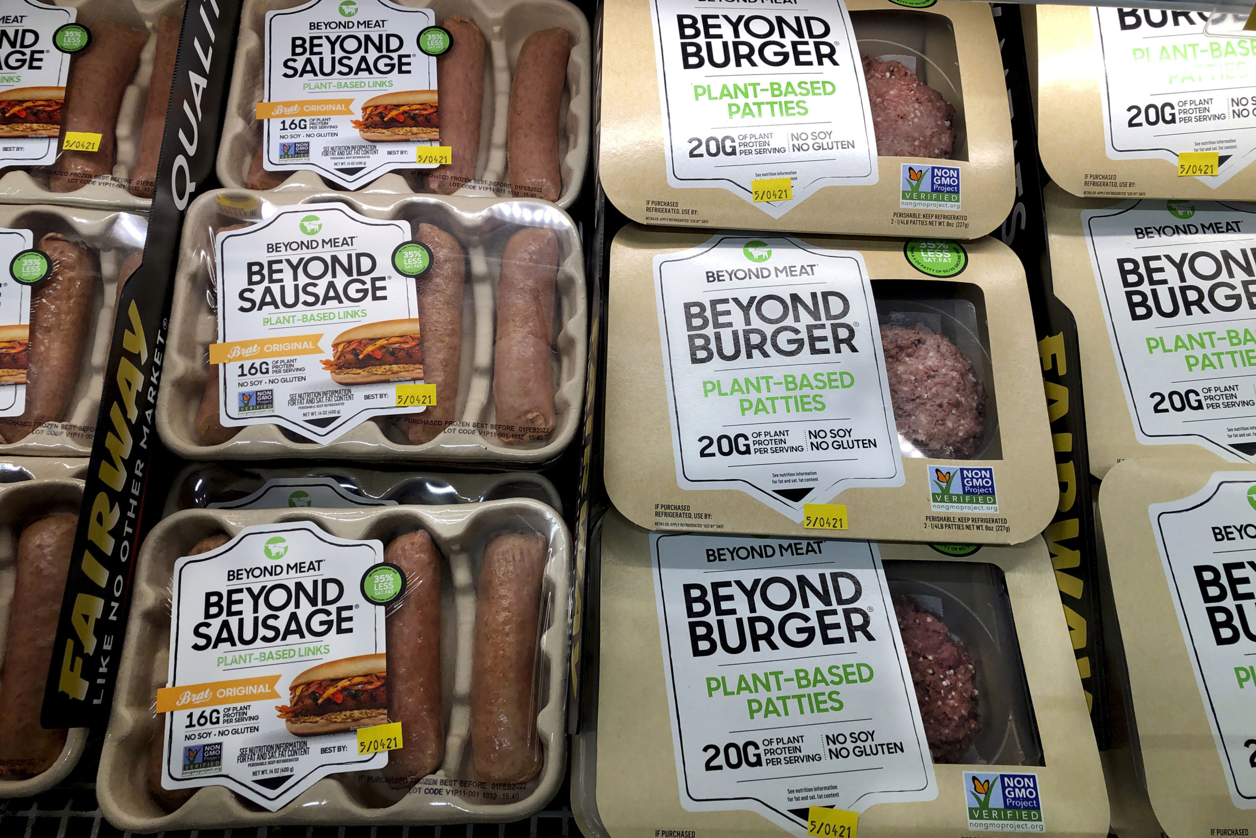 Packages of Beyond Meat's Beyond Burgers and Beyond Sausage are pictured in a New York City store on April 29, 2021.