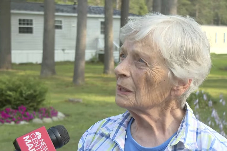 Marjorie Perkins speaks to a reporter on Wednesday at her home in Brunswick, Maine.
