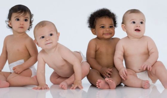 Four babies are pictured in this stock photo. Recently, Facebook Marketplace has come under scrutiny due to recalled baby items being sold on the platform.
