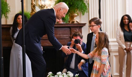President Joe Biden greets children after speaking in the East Room of the White House in Washington, D.C., on Wednesday.