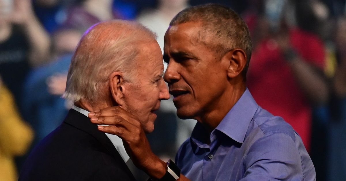 President Joe Biden, left, and former President Barack Obama, right, embrace on stage during a rally for then Pennsylvania Democratic Senate nominee John Fetterman in Philadelphia, Pennsylvania, on Nov. 5, 2022.