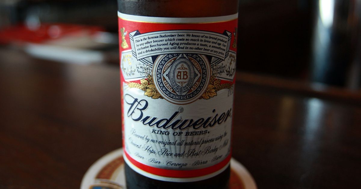 A bottle of Budweiser beer is displayed at a bar in New York City on June 13, 2008, the year Anheuser-Busch was purchased by the Belgian conglomerate InBev.