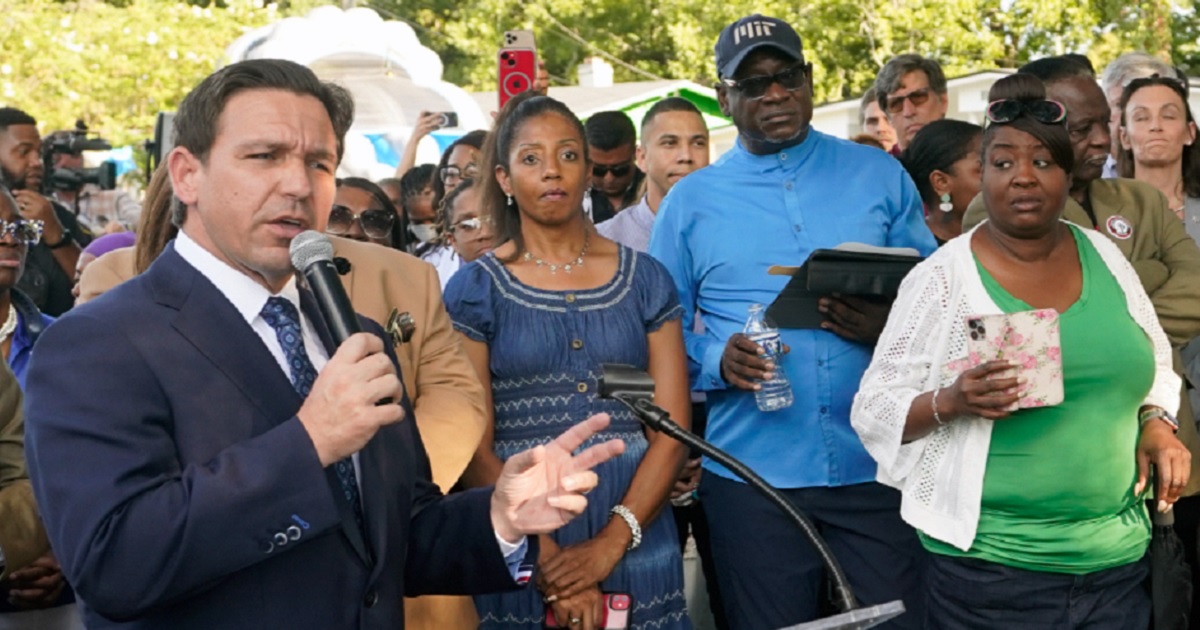 Florida Gov. Ron DeSantis speaks at a prayer vigil Sunday for the victims of a racist shooting a day earlier, in Jacksonville, Florida.