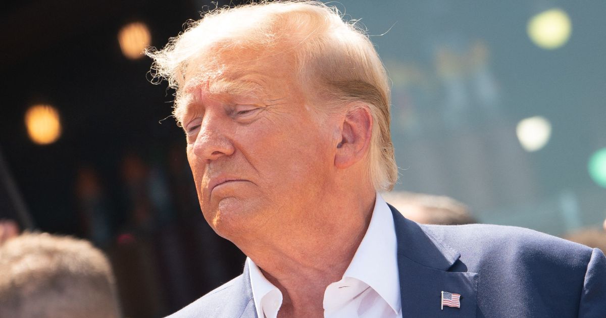 Former President Donald Trump leaves after speaking at the Iowa State Fair in Des Moines, Iowa, on Saturday.