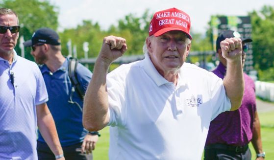 Former President Donald Trump greets supporters during the final round of the LIV Golf Bedminster Invitational in Bedminster, New Jersey, on Sunday.