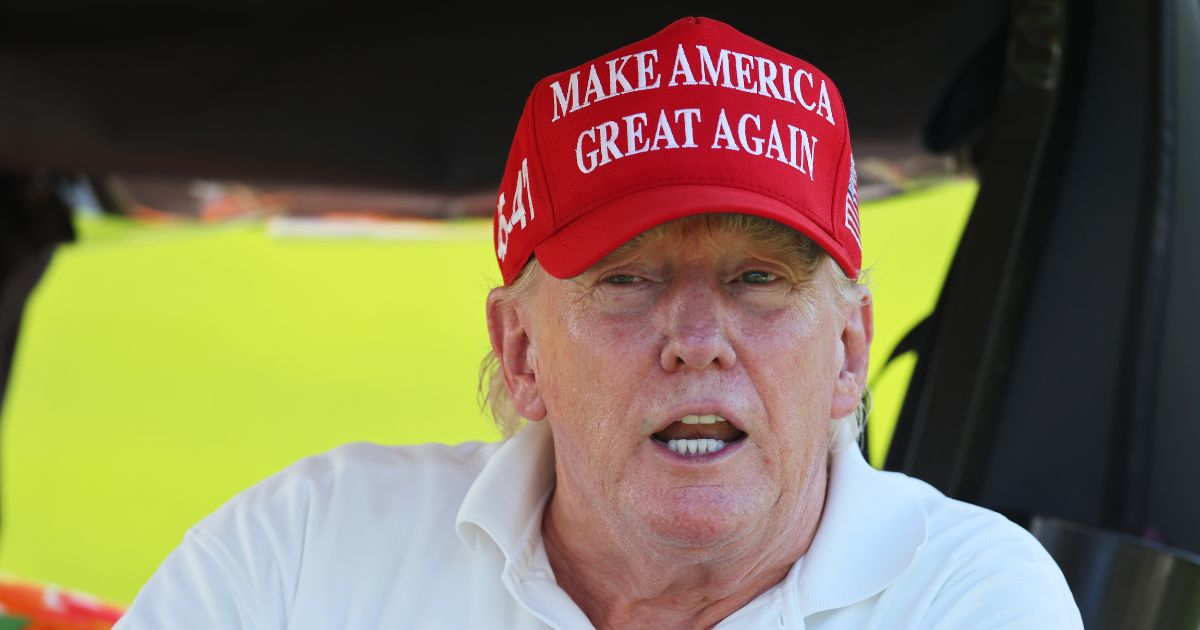 Former President Donald Trump is seen on the on the 15th hole during day one of the LIV Golf Invitational - Bedminster at Trump National Golf Club in Bedminster, New Jersey, on Friday.