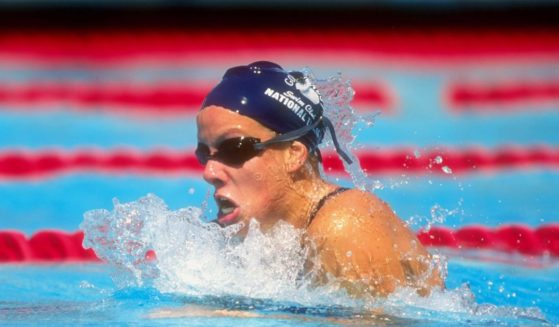 Jamie Cail swimming in a championship in 1998