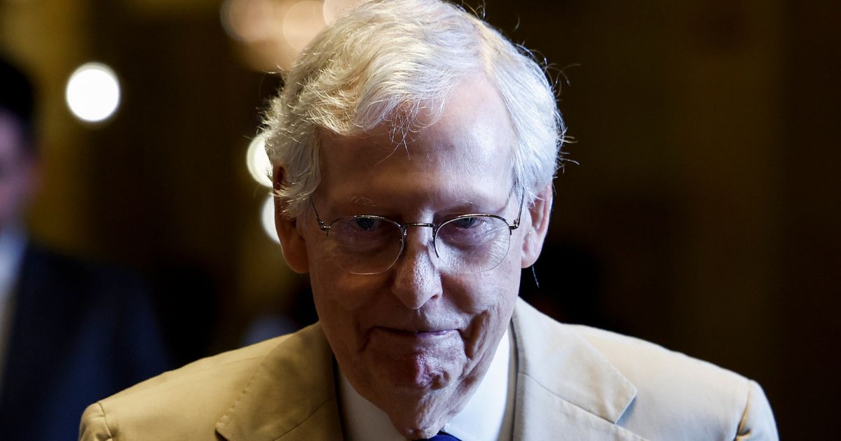 Senate Minority Leader Mitch McConnell walks to give remarks on the floor of the Senate Chambers at the U.S. Capitol Building on July 25. McConnell has frozen up twice on camera in recent weeks.