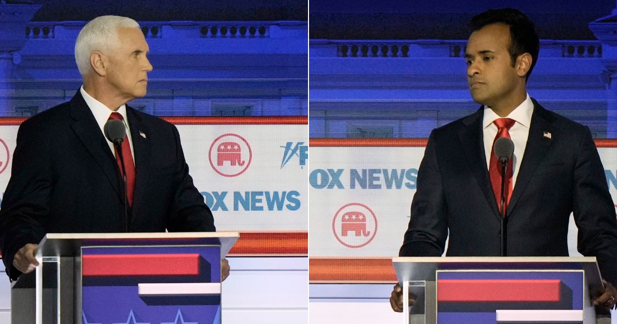 During Wednesday's Republican primary debate, former Vice President Mike Pence, left, was booed by the audience after he attacked Vivek Ramaswamy, right.